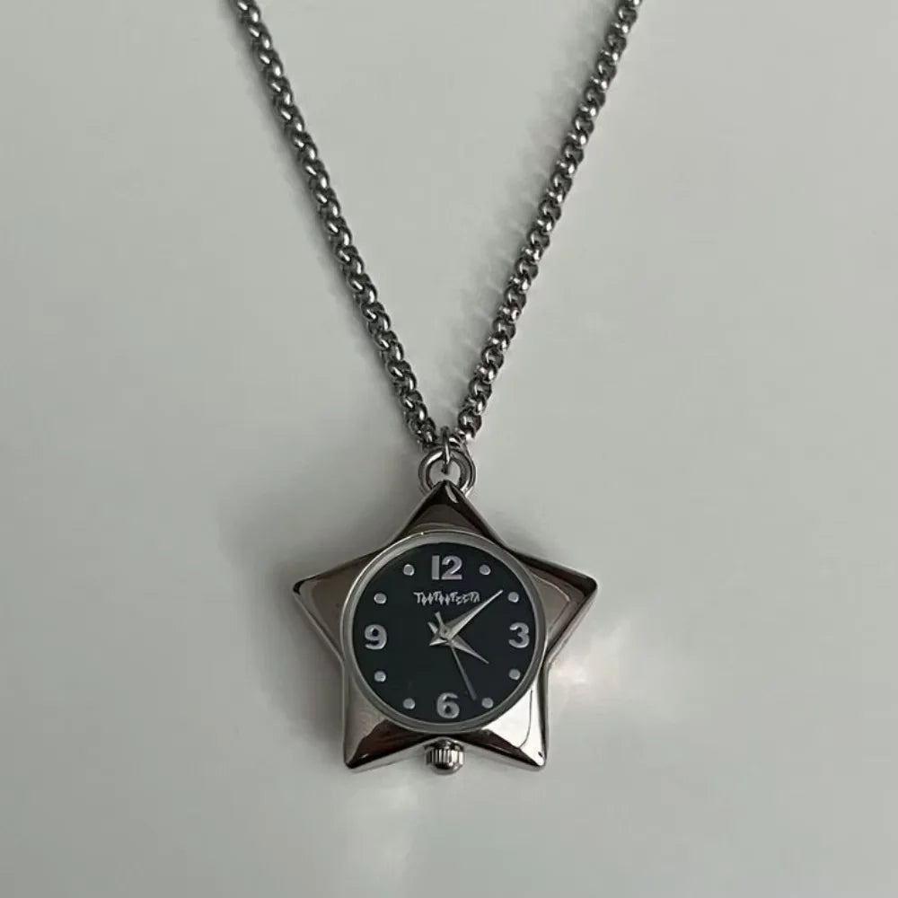 Silver chain necklace with a star-shaped pocket watch pendant displaying the time.