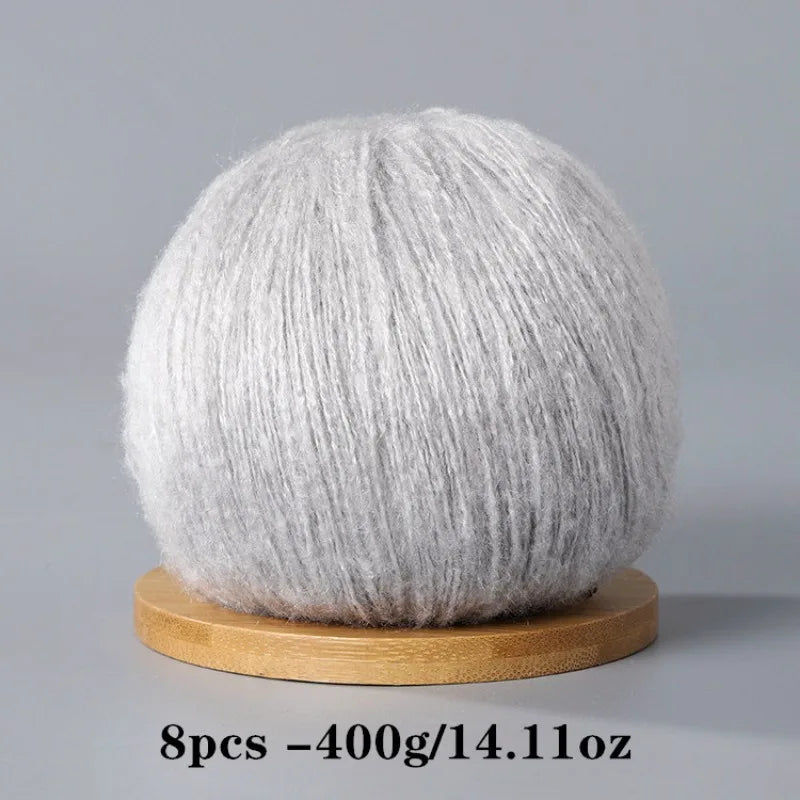 A ball of light gray premium mohair yarn for crafting