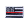 An embroidered patch of the American flag with a hook and loop backing.