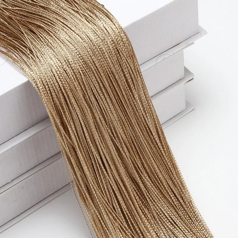 Golden metallic thread curtain tie-back for doors and windows
