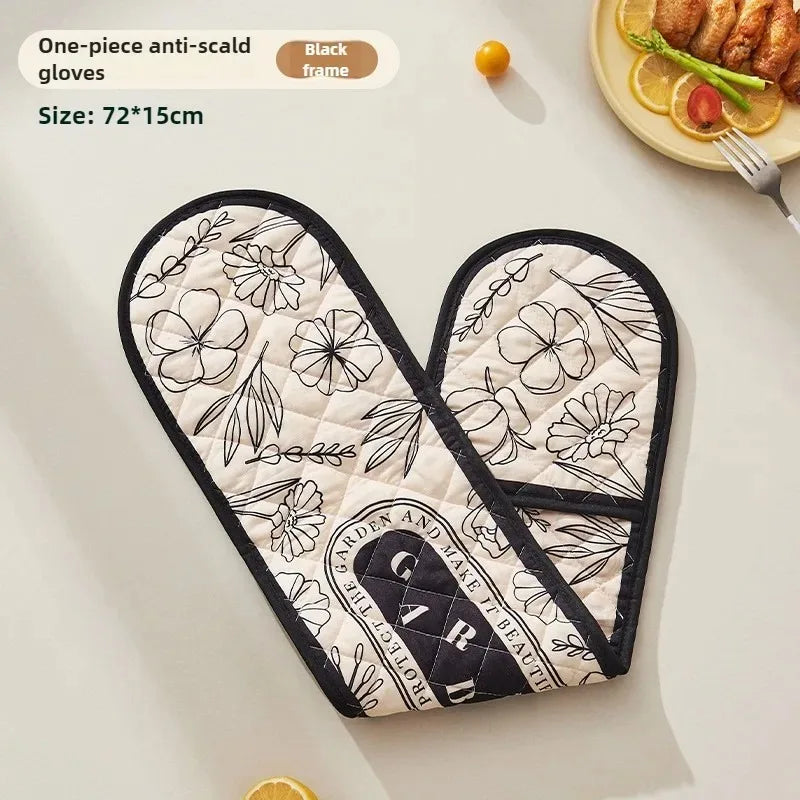 One-piece anti-scald gloves in black frame with a floral pattern shown on a white surface.