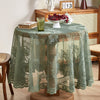 A round floral lace tablecloth with a tatting weave displayed on a wooden table.