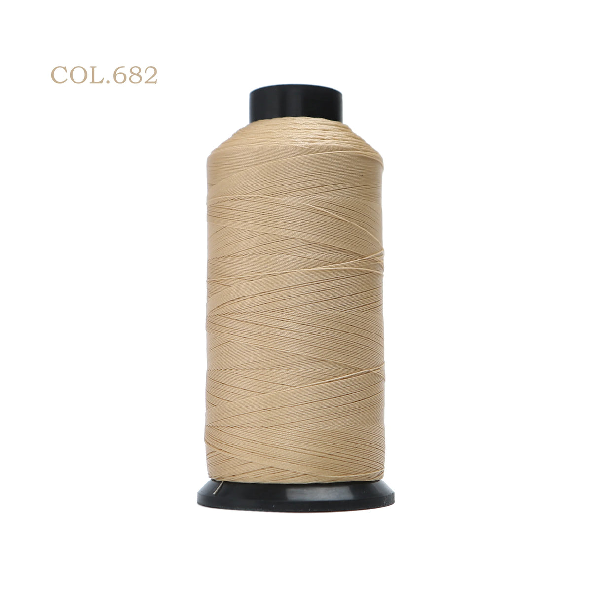 A spool of beige heavy duty nylon sewing thread with a black core.
