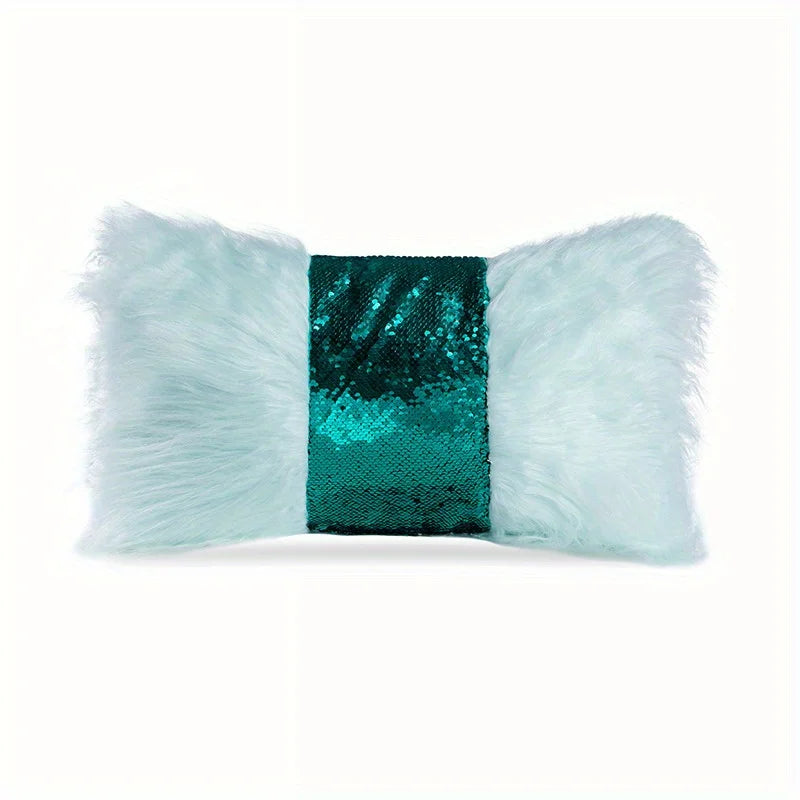 A light blue fluffy cushion cover with a dark green sequin accent panel.