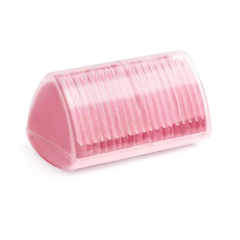 A pink, cylindrical eraser with ribbed texture used for fabric chalk markers.