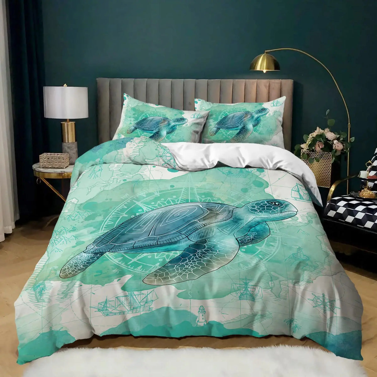 A sea turtle patterned duvet cover set displayed on a bed with a gray headboard and green accent wall.