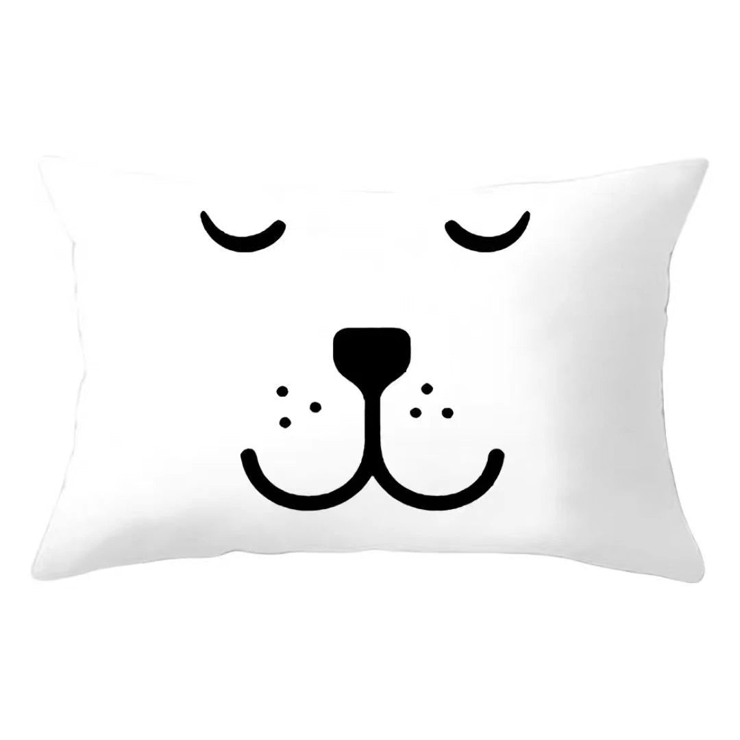 A white decorative pillow cover featuring a minimalist black cat face design.