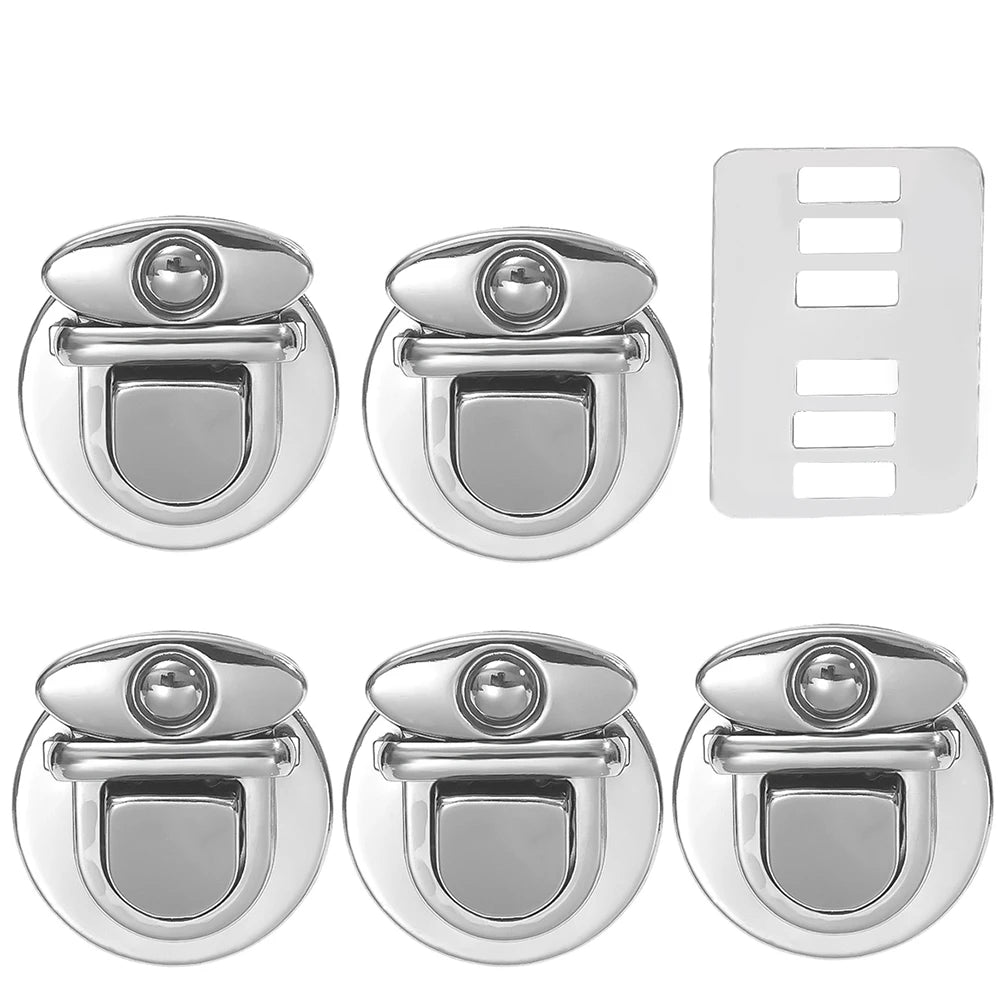 A set of five silver metal bag lock clasps for handbags and totes, including a rectangular version.