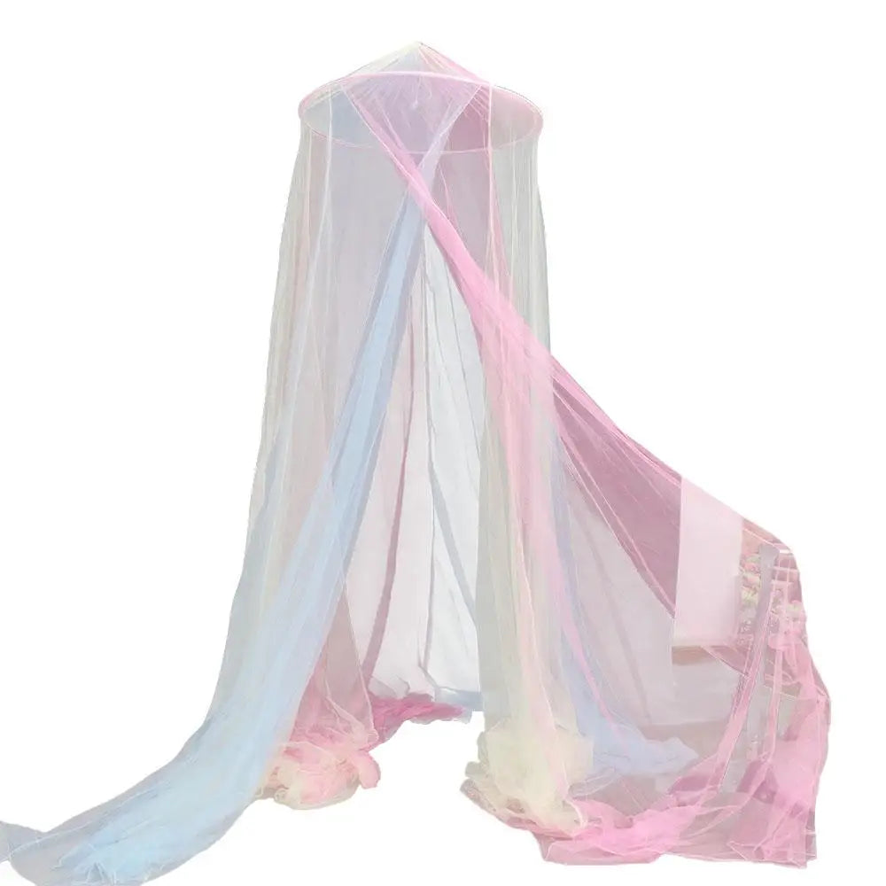 A sheer rainbow mesh mosquito netting canopy in shades of pink, blue, and white.