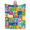 A colorful flannel throw blanket featuring cartoon characters from Sesame Street including Elmo and friends.