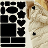 Black self-adhesive fabric repair patches arranged in a grid next to a beige quilted down jacket.