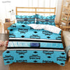 A set of blue and white patterned duvet covers featuring MCM and WCW designs displayed on a bed.
