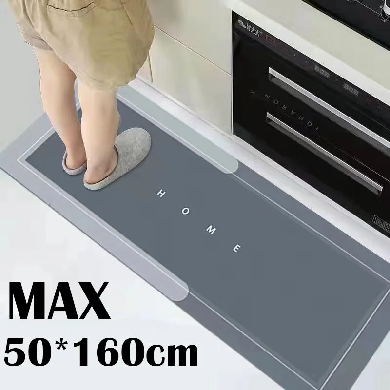 A gray non-slip floor mat labeled HOME and MAX size 50x160cm placed on a kitchen counter.