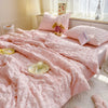 Pink summer seersucker quilt comforter spread on a bed with a stuffed animal and white bedding