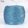 A ball of metallic blue silk yarn used for crocheting and knitting.