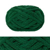 A ball of dark green hand-knitted wool finger line yarn.