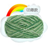 A ball of green premium milk cotton yarn labeled as 03 level, set against a white cloud and a rainbow background.