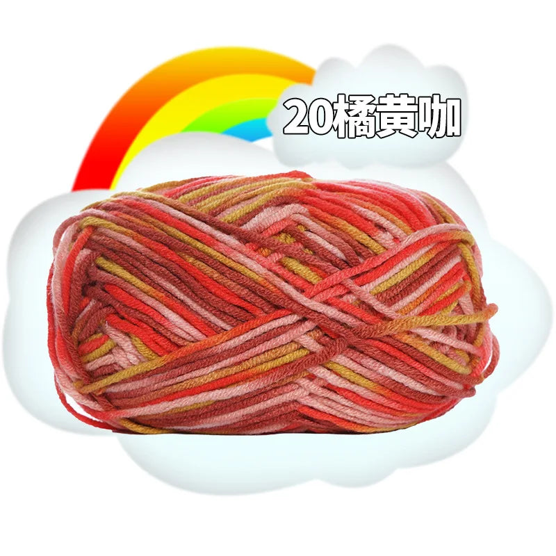 A ball of reddish-orange yarn with a rainbow background, labeled as Premium Milk Cotton Yarn for Knitting.