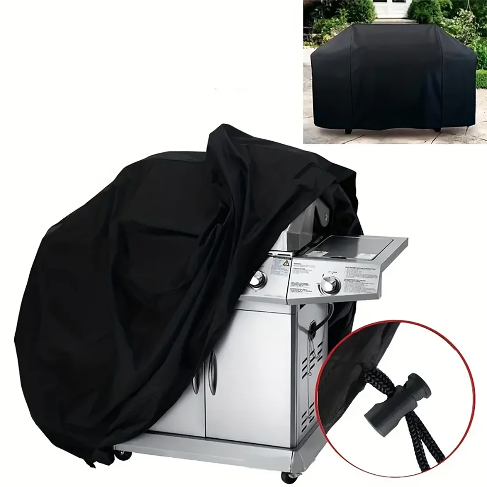 Black heavy-duty grill cover protecting a stainless steel BBQ grill.
