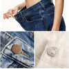 Close-up of dark denim jeans showing adjustable no-sew metal buttons on the pocket