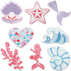 A collection of embroidered patches featuring a starfish, a star, a heart, a coral, a mermaid, and a seashell.