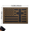 A rectangular embroidered patch featuring a distressed American flag and a cross design on a dark brown fabric.