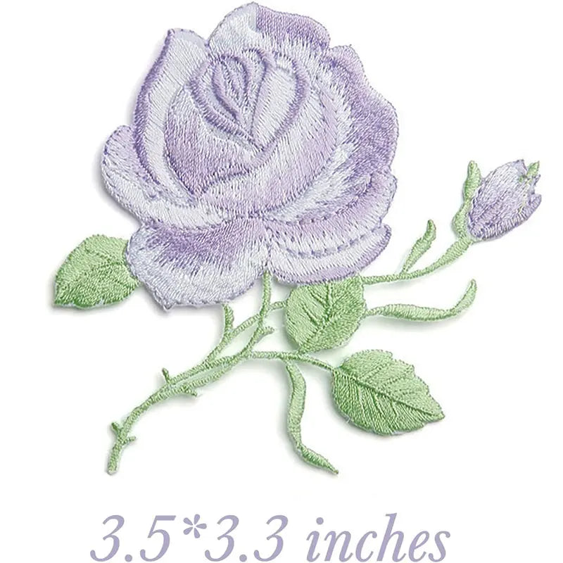 Embroidered iron-on patches featuring a purple rose and green leaves.