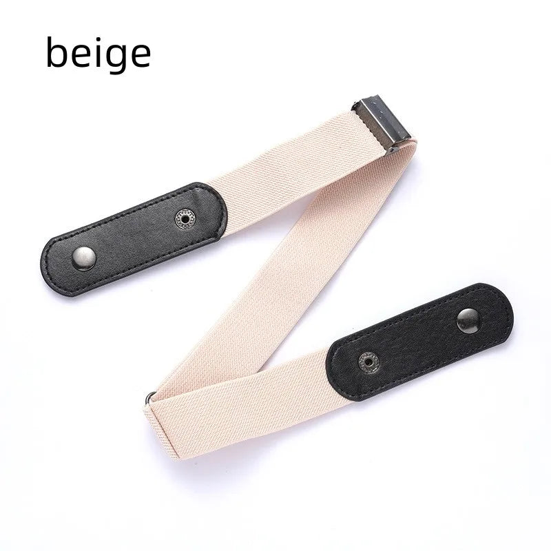 A beige invisible stretch belt with a black buckle is shown on a white background.
