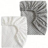 A pair of soft plush mattress and diaper changing covers in white and gray.