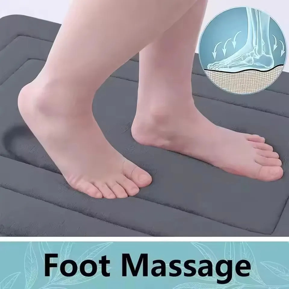 Foot massage device showing a foot placed on a mat with an inset diagram of the sole.