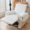 A beige quilted stretch recliner cover with storage pockets shown on a wooden floor.