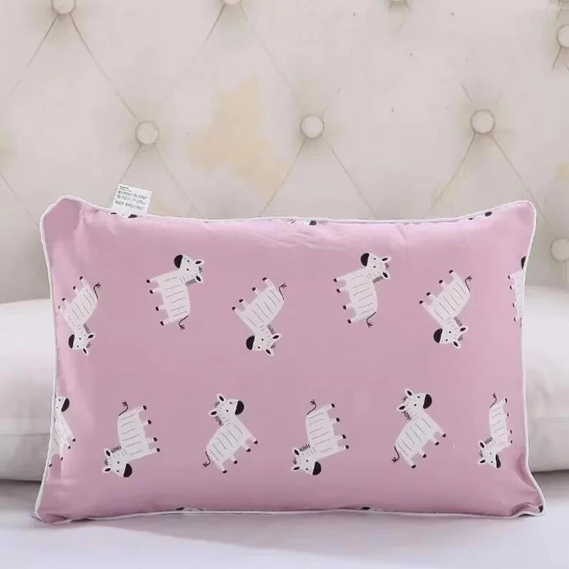 A pink cartoon style children's pillowcase featuring white drawings of a horse.
