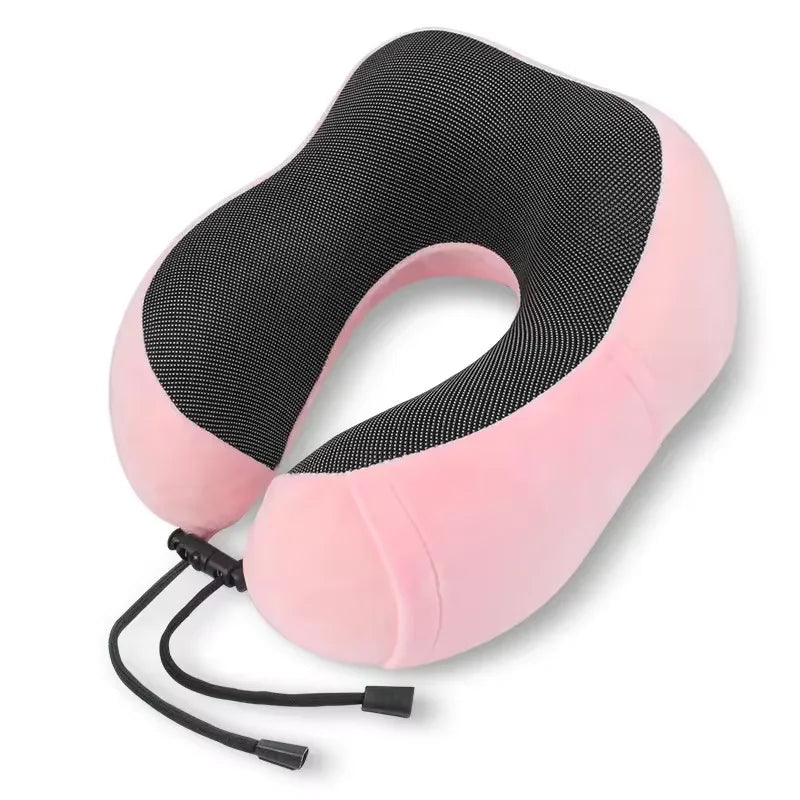 Pink ergonomic memory foam neck pillow with black mesh cover and adjustable strap