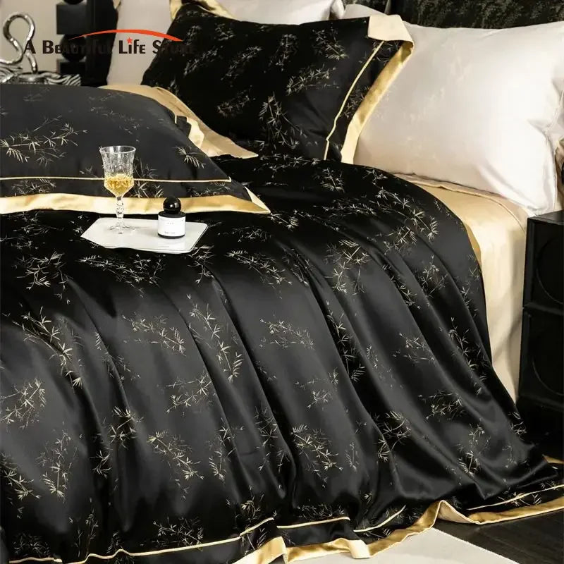 Black and gold luxury lyocell eucalyptus bedding set featuring a duvet cover, pillows, and a glass of amber liquid.