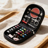 A black multi-functional sewing kit with various tools and thread spools is displayed on a wooden tray.