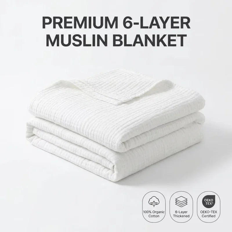 A stack of white 6-layer muslin blankets with an OEKO-TEX certified label.