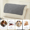 Three gray waterproof recliner headrest protector covers shown in use on a light-colored chair.