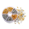 A clear plastic container filled with various gold and silver lobster clasp findings for jewelry making.