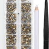 A clear plastic container holds various sizes and colors of crystal hot fix rhinestones and an applicator tool.