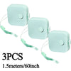 Three light mint green retractable measurement tapes, 1.5 meters long.