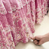 Pink floral print bed skirt set fabric draped in soft folds