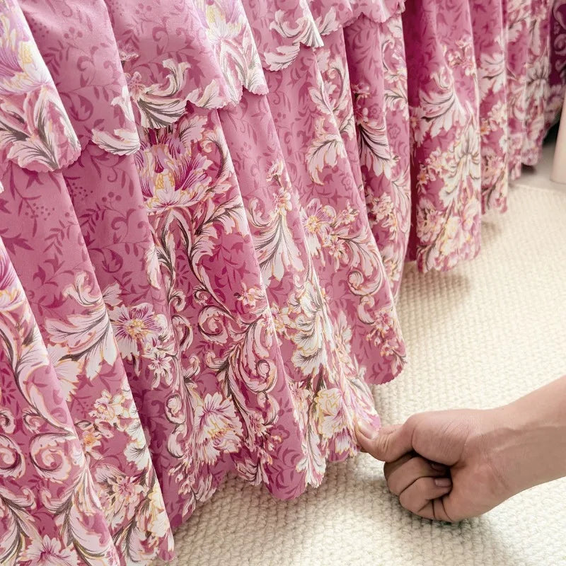 Pink floral print bed skirt set fabric draped in soft folds