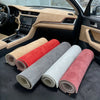 Rolls of premium suede auto headliner fabric with foam backing in various colors like red, gray, and beige.