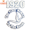 A white embroidered patch featuring the year 1920 and the text The finer woman in the room.