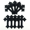 A set of black embroidered cross applique patches for clothing