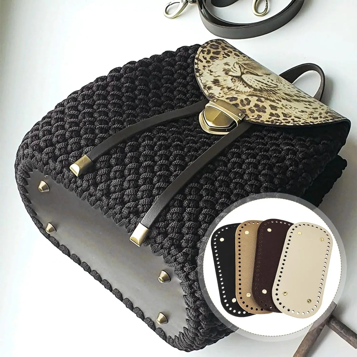 A black crocheted bag with leather bottom pads and a leopard print flap.