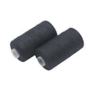 A roll of heavy duty polyester sewing thread in black and white.