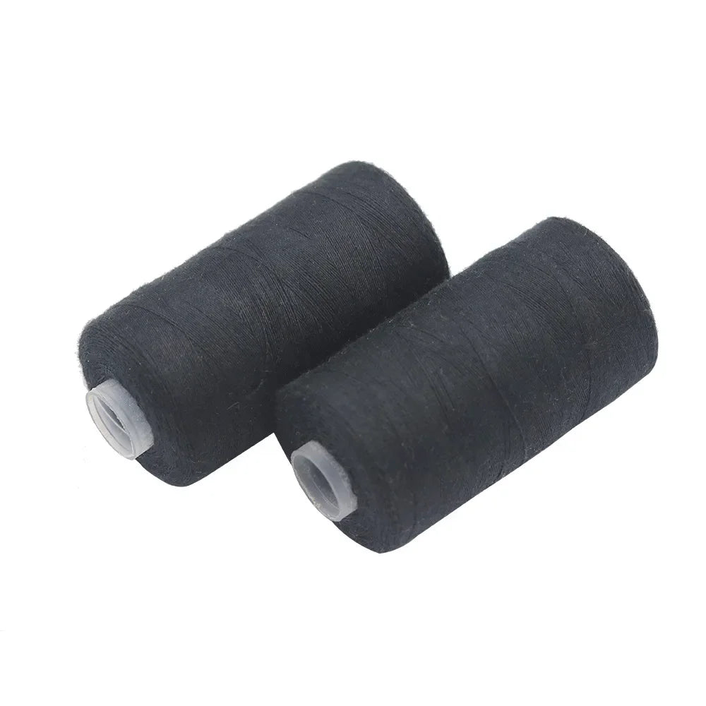 A roll of heavy duty polyester sewing thread in black and white.