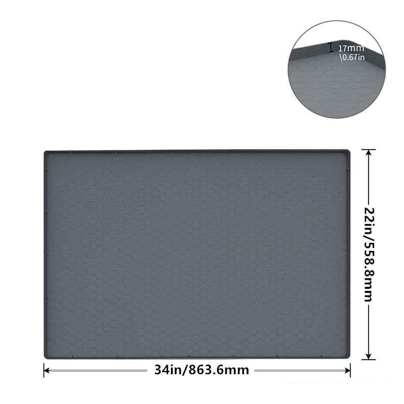 A rectangular gray silicone under sink drain mat measuring 34 inches by 22 inches with a 17mm thickness.