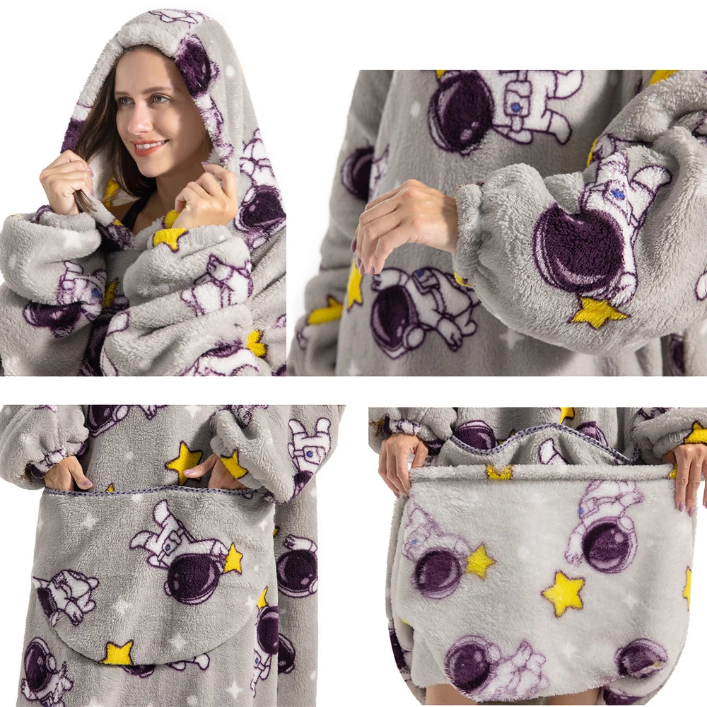A woman wearing a gray and purple patterned plush fleece blanket hoodie.